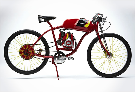 A red Derringer board-track-style bike with yellow-spoked wheels